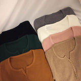 ボタンネックリブトップス