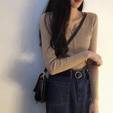 ボタンネックリブトップス