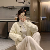 ボタンアクセントケーブルカーディガン