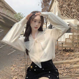 ビジューボウタイリボンブラウス