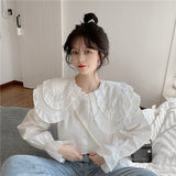 ダブルカラービジューブラウス