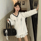 Vトラックアクセントリボンユニトップス