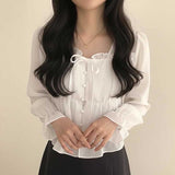 フレアリボンティアードブラウス