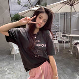ピンクウォッシュプリントTシャツ