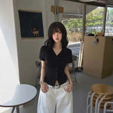 シャーリングVネックボタントップス