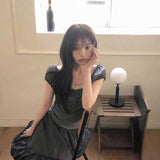 パフシャーリングリボントップス