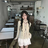 ネックタイクリームカーディガン