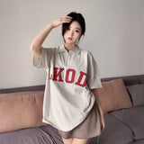 グレーロゴハーフジップTシャツ