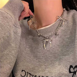 シルバートリプルリボンネックレス