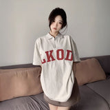 グレーロゴハーフジップTシャツ