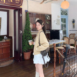 フリルボタンクリームブルゾン