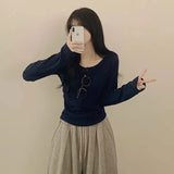 ボタンネックリブニット
