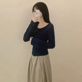 ボタンネックリブニット