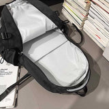 ロゴポーチ付きカモフラージュリュック