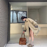 チェックアクセントノーカラートレンチコート