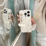 羽根チャーム付き白うさぎiPhoneケース