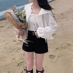 ラッシュガードフリルブラウス