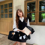 ワンポイントケーブルニットベスト