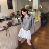 リボン刺繍ケーブルポロニット