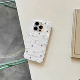 羽根チャーム付き白うさぎiPhoneケース