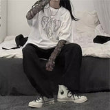 グラフィックシースルートップス