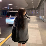 モノトーンルーズケーブルカーディガン