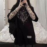 グラフィックシースルートップス
