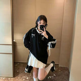 Vトラックアクセントリボンユニトップス